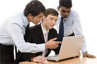 Three engineers discussing new customer project