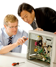 Engineer building computer for customer