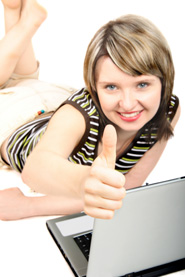 Happy teenage girl with laptop