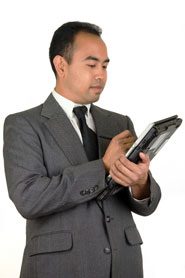 Male manager using tablet computer